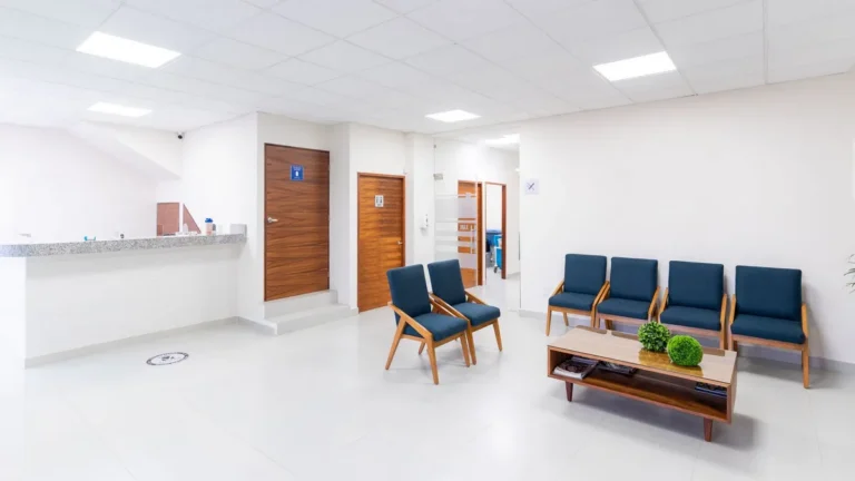 Bright and clean medical waiting room with modern seating and decor.