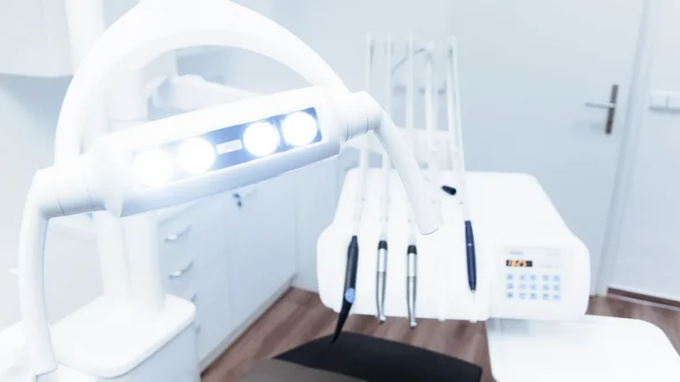 Bright and clean modern dental clinic room with advanced dental equipment.