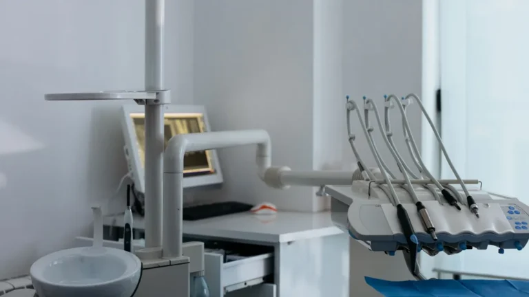 Close-up of advanced dental chair setup with dental instruments in a clinic.