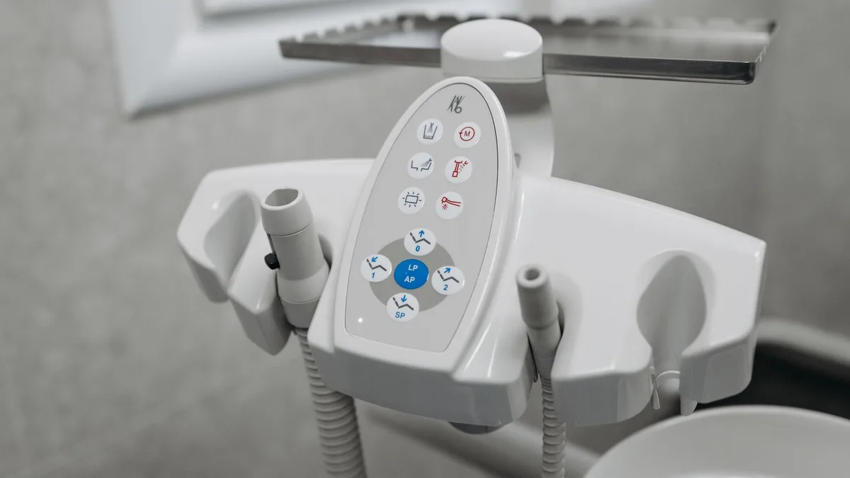 Close-up of advanced dental equipment in a clinic setting, showcasing technology.