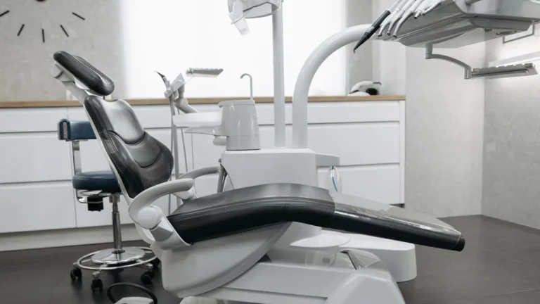 A contemporary dental office with a sleek dental chair and equipment, perfect for healthcare themed needs.