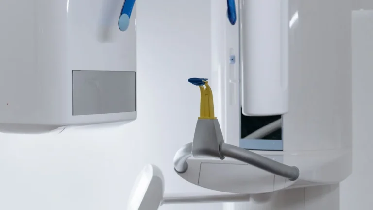 Close-up of modern dental x-ray equipment in a clinic displaying advanced odontology technology.