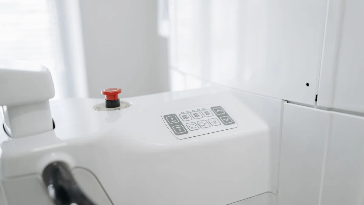 Close-up of advanced dental machine in a bright, modern clinic.
